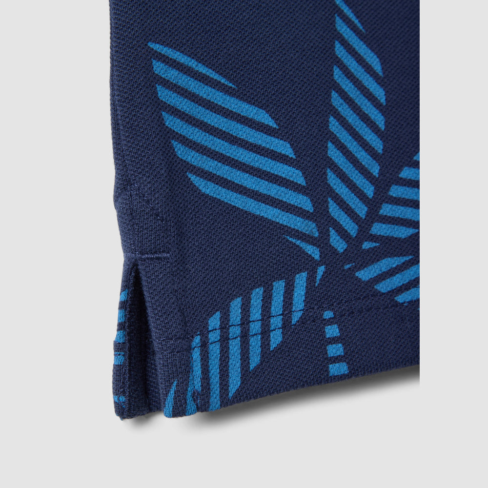 OVS | Polo azul de algodón puro con estampado floral para niño