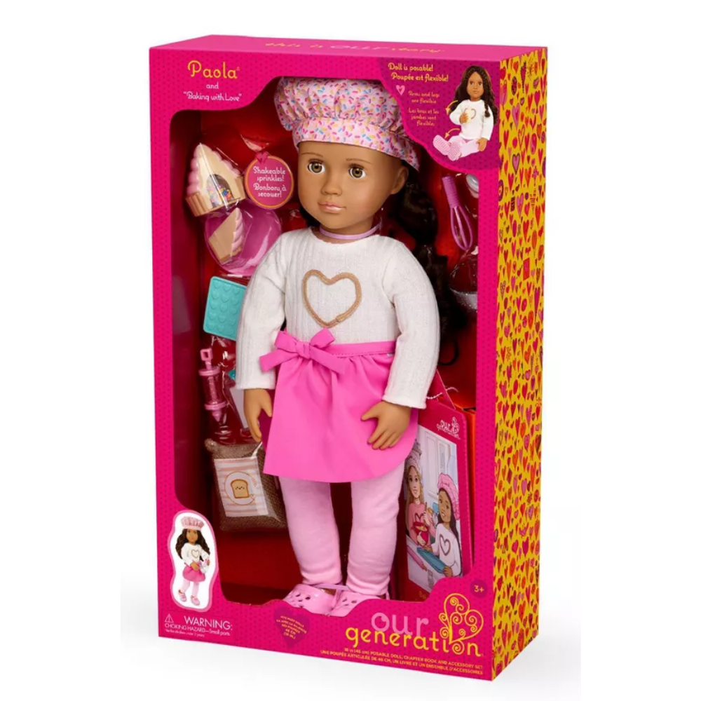 Our Generation Paola Muñeca Con Accesorios Para Hornear y Libro