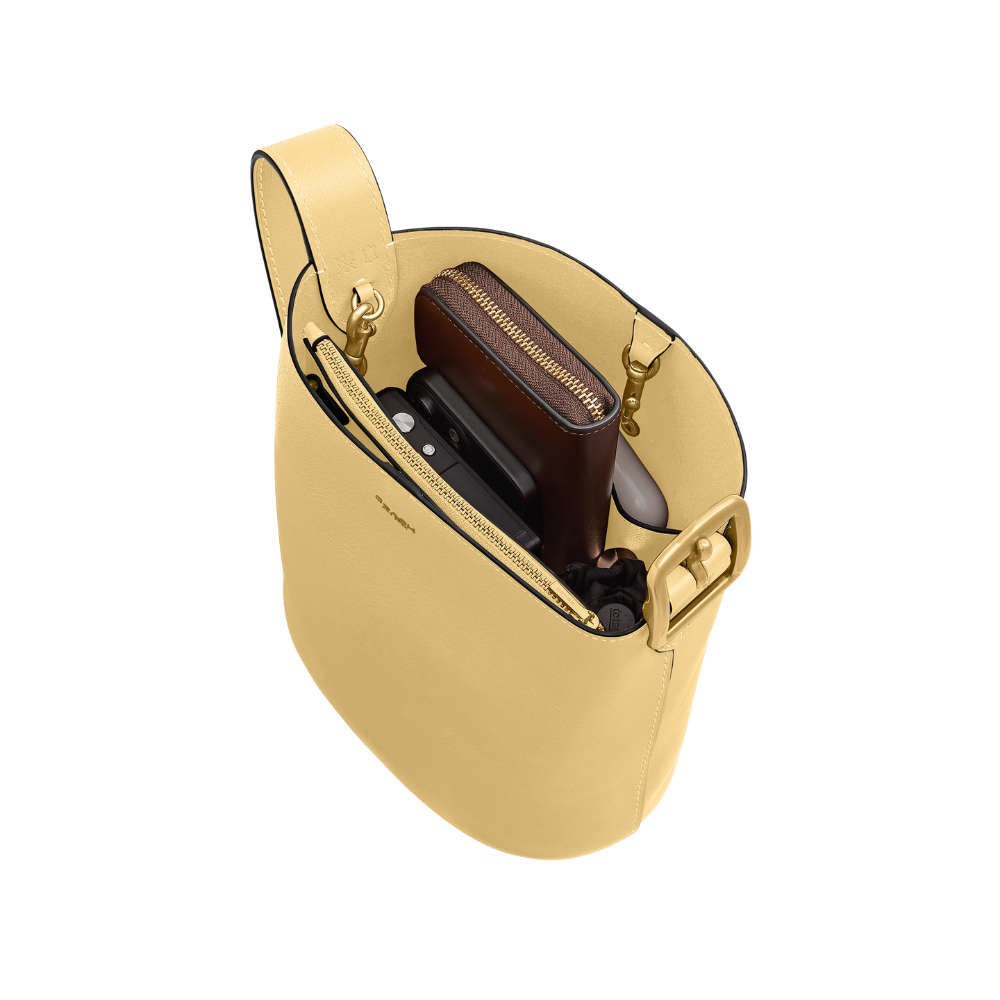Coach | Bolso tipo cubo Bleecker de piel con veteado natural 21