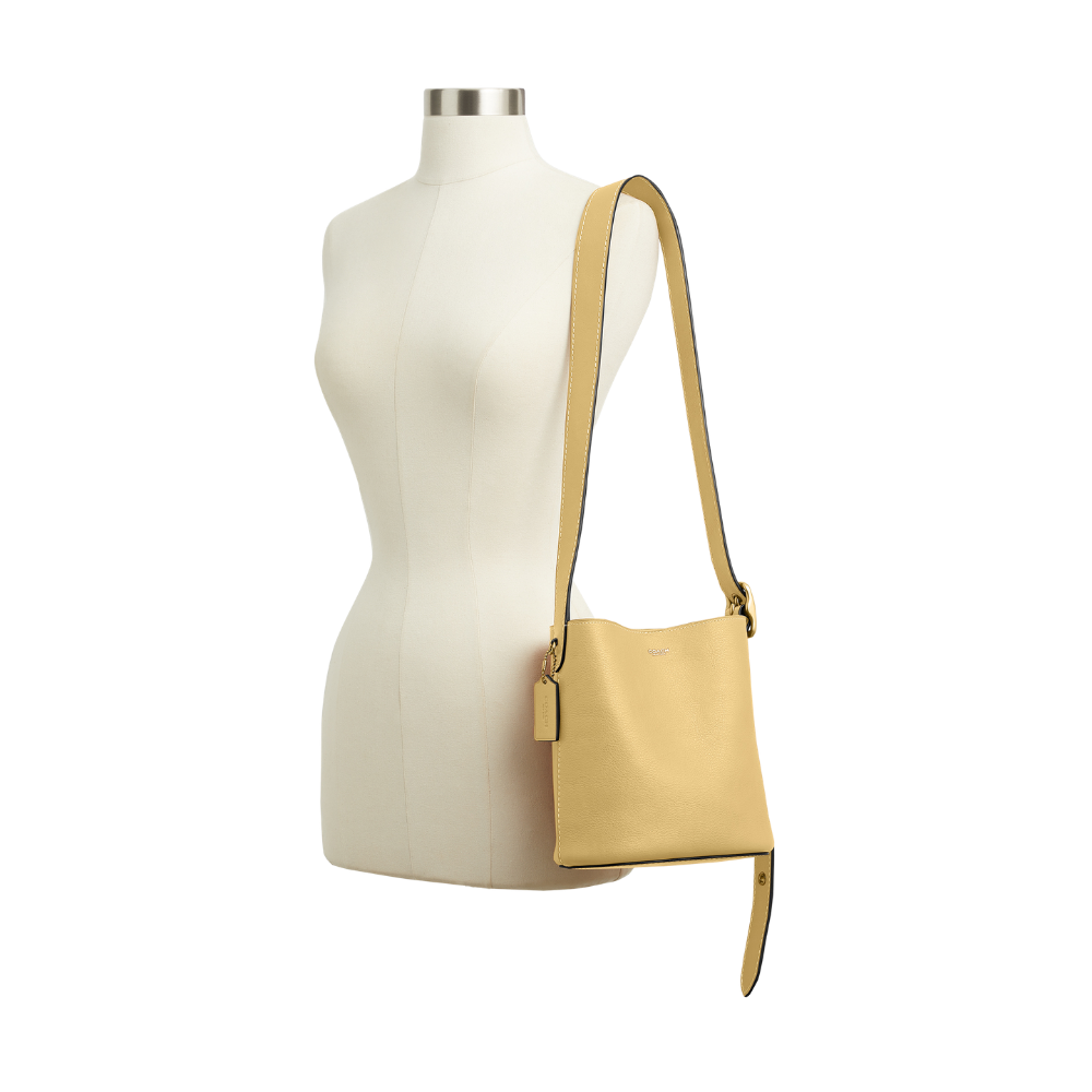 Coach | Bolso tipo cubo Bleecker de piel con veteado natural 21