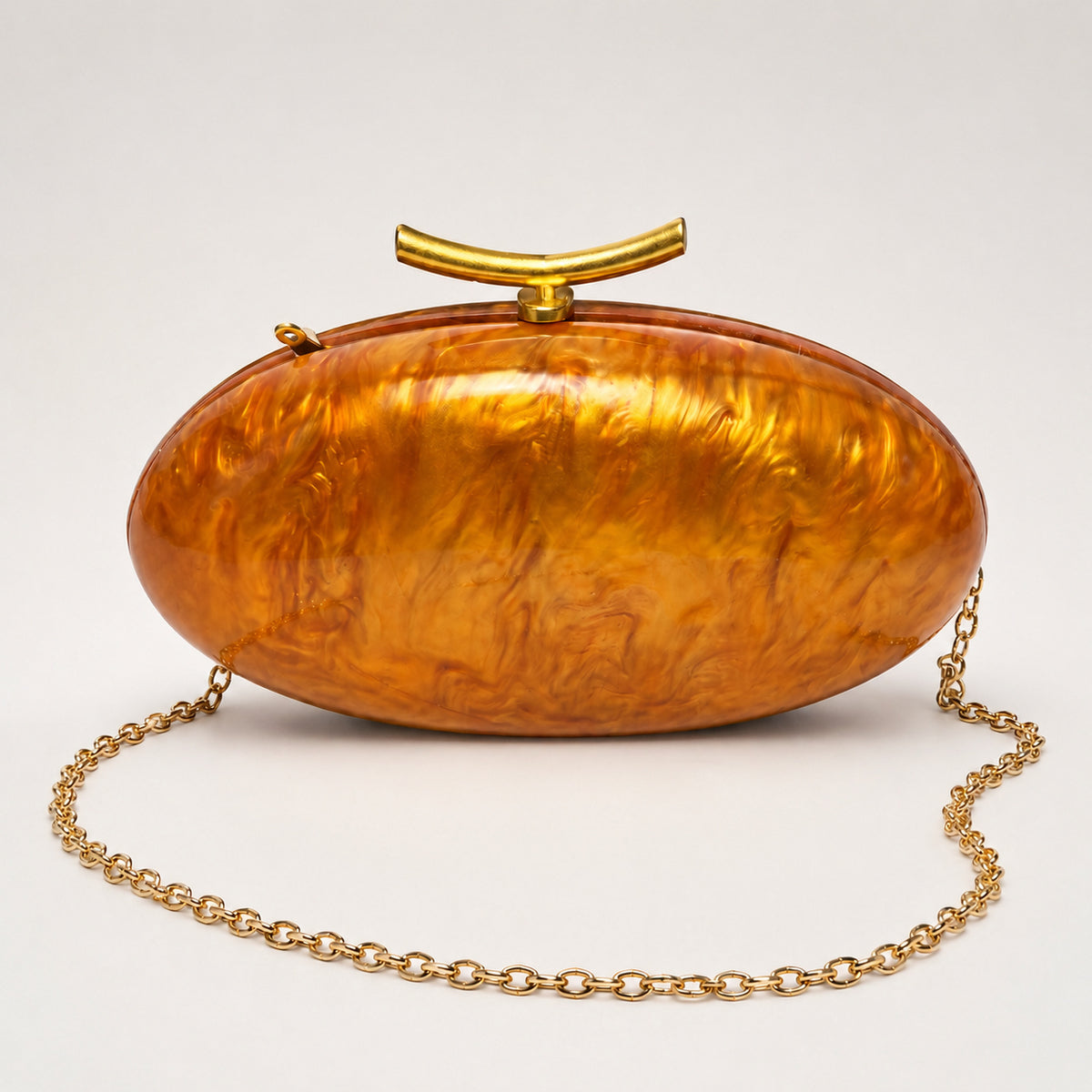 OLEA | Clutch Ovalado Efecto Nácar Naranja