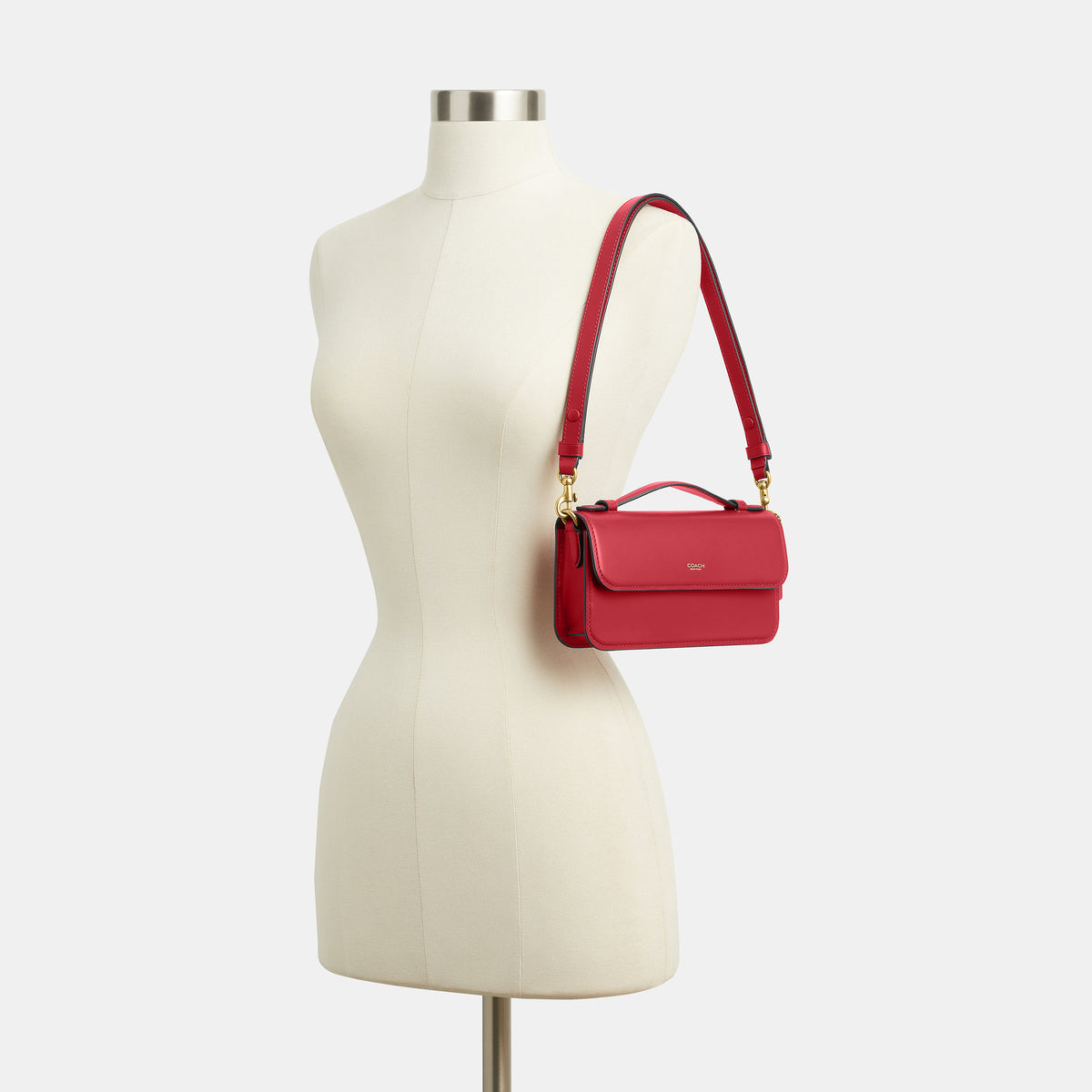 Coach | Cartera cruzada Elora con asa superior