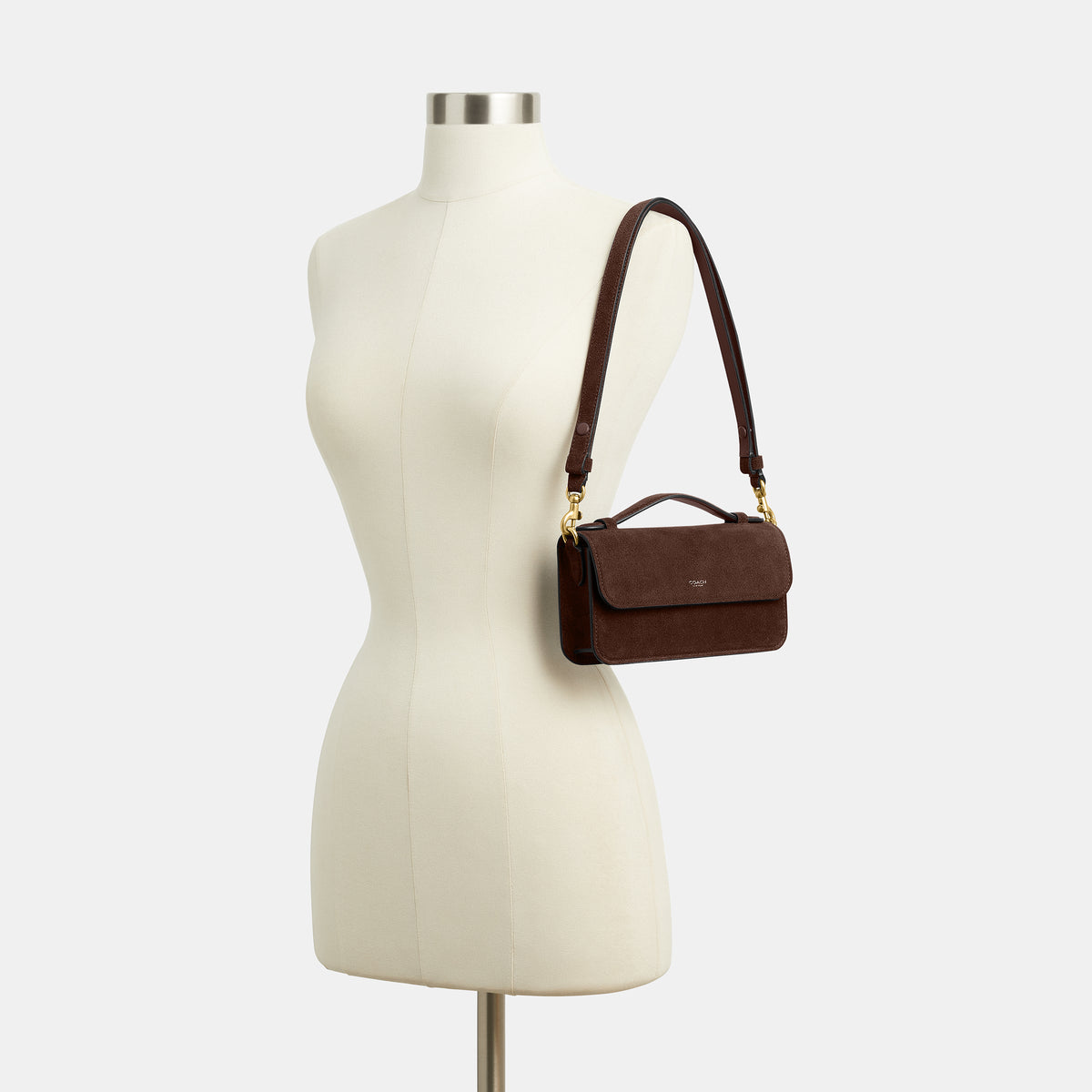 Coach |  Bolso bandolera Elora con asa superior