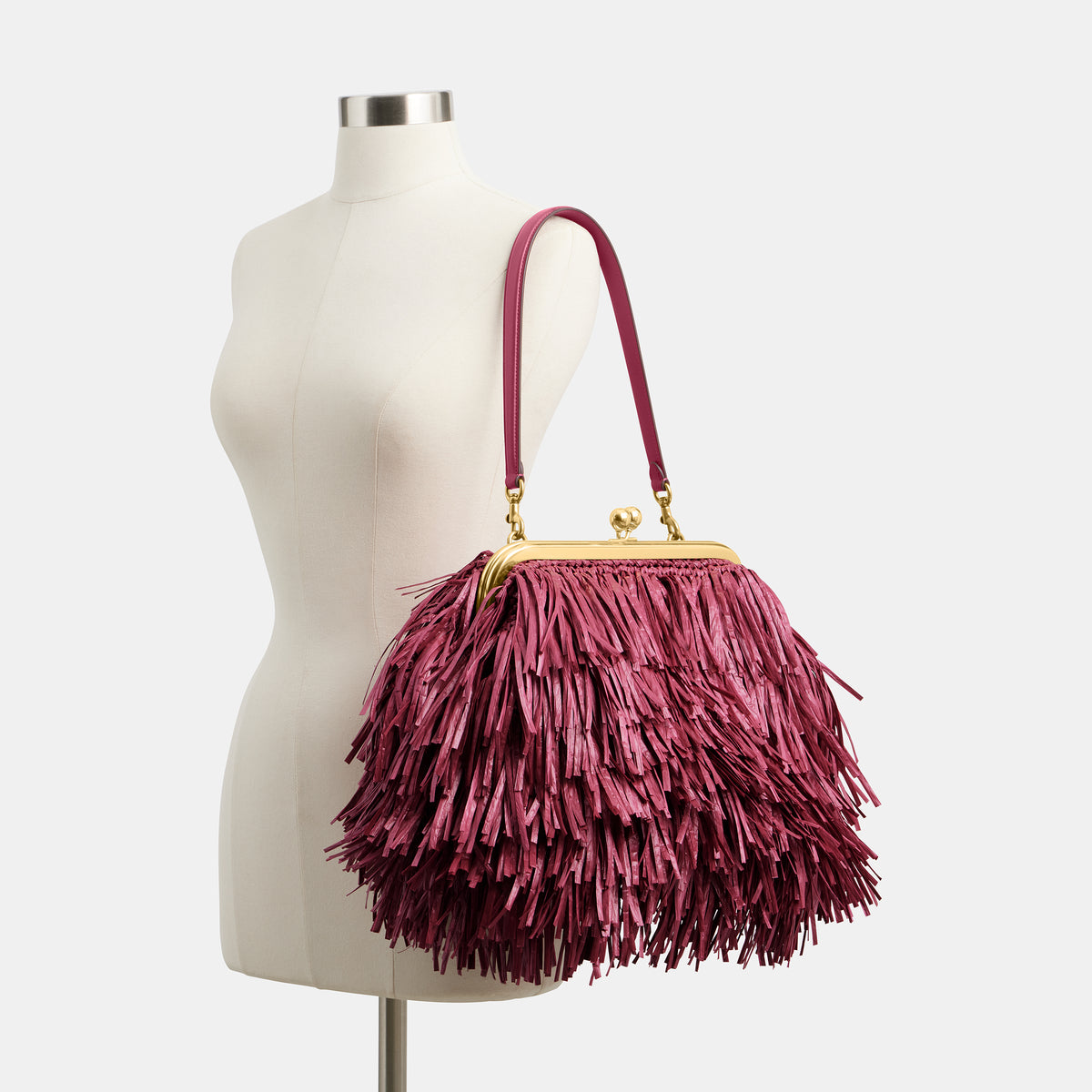 Coach  |  Bolsa para cuadro Kisslock 27