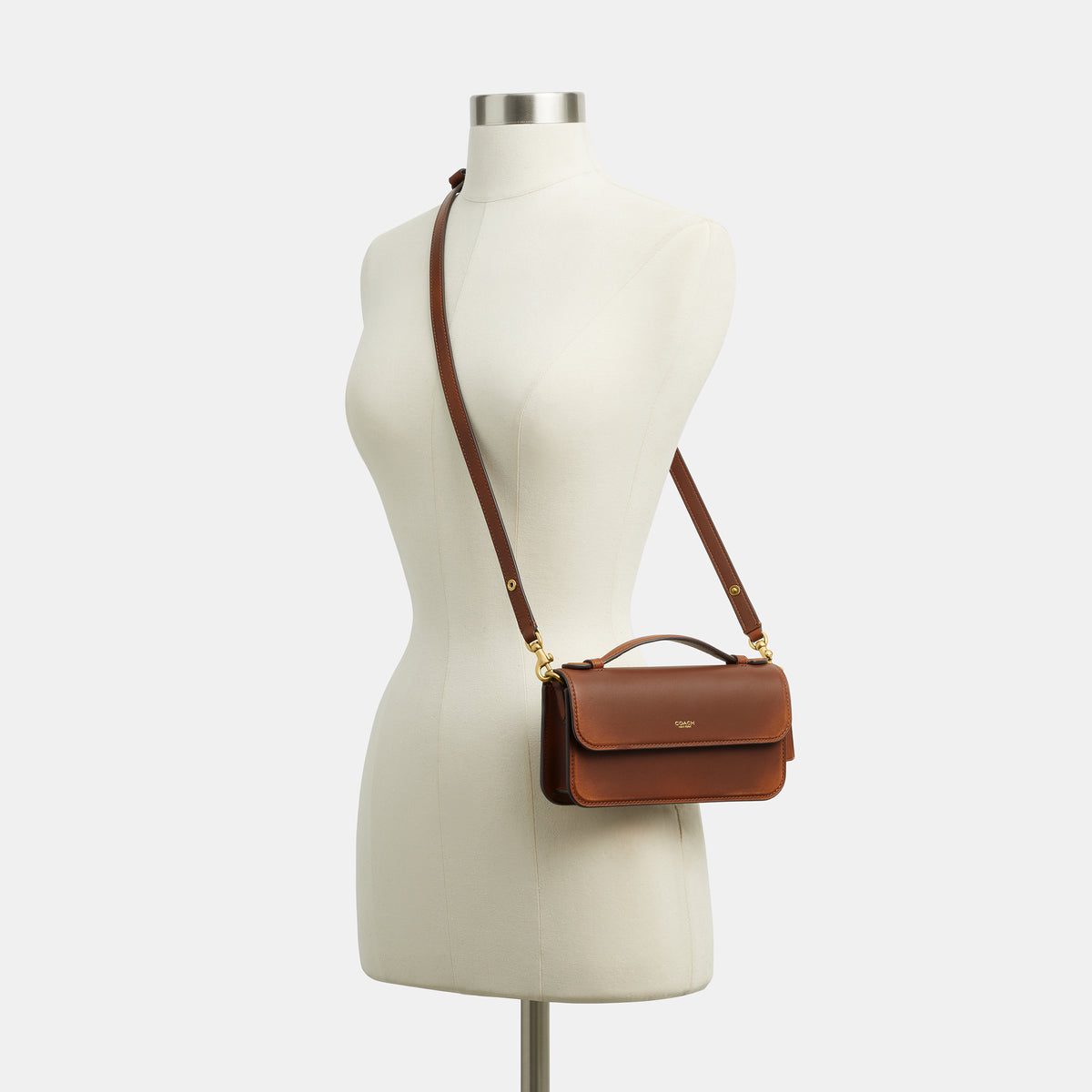 Coach | Cartera cruzada Elora con asa superior