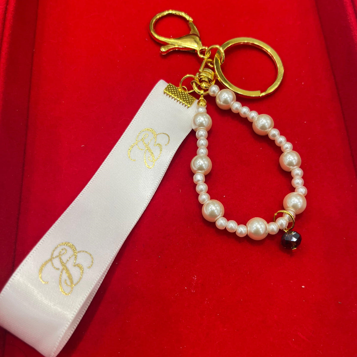 Regalía: Estee Lauder Holiday Bag Charm