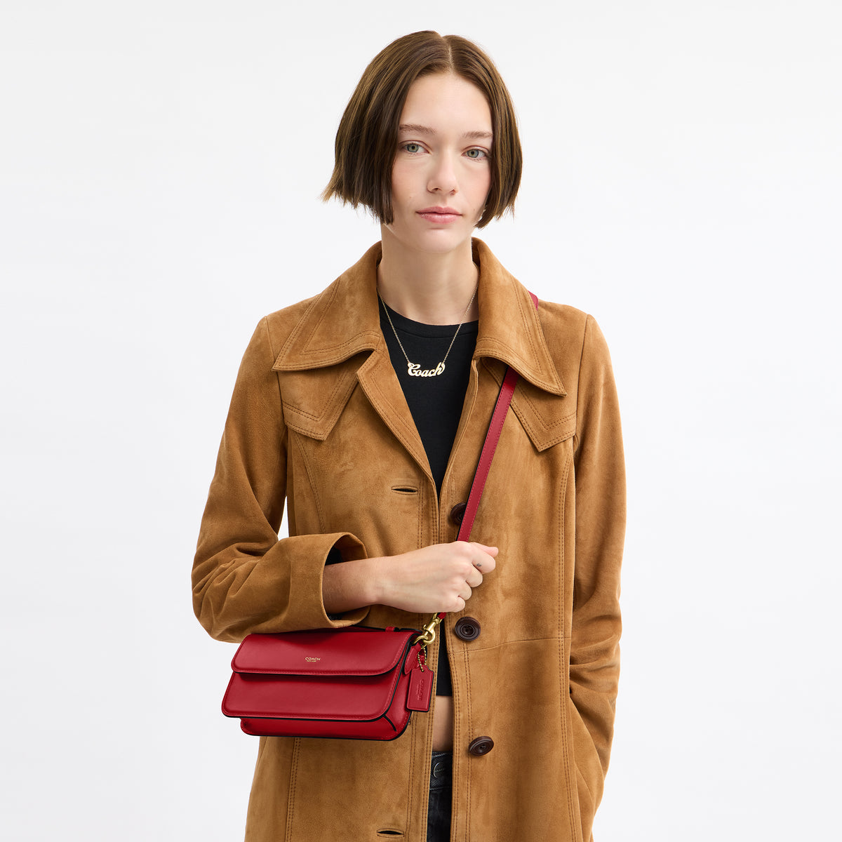 Coach | Cartera cruzada Elora con asa superior
