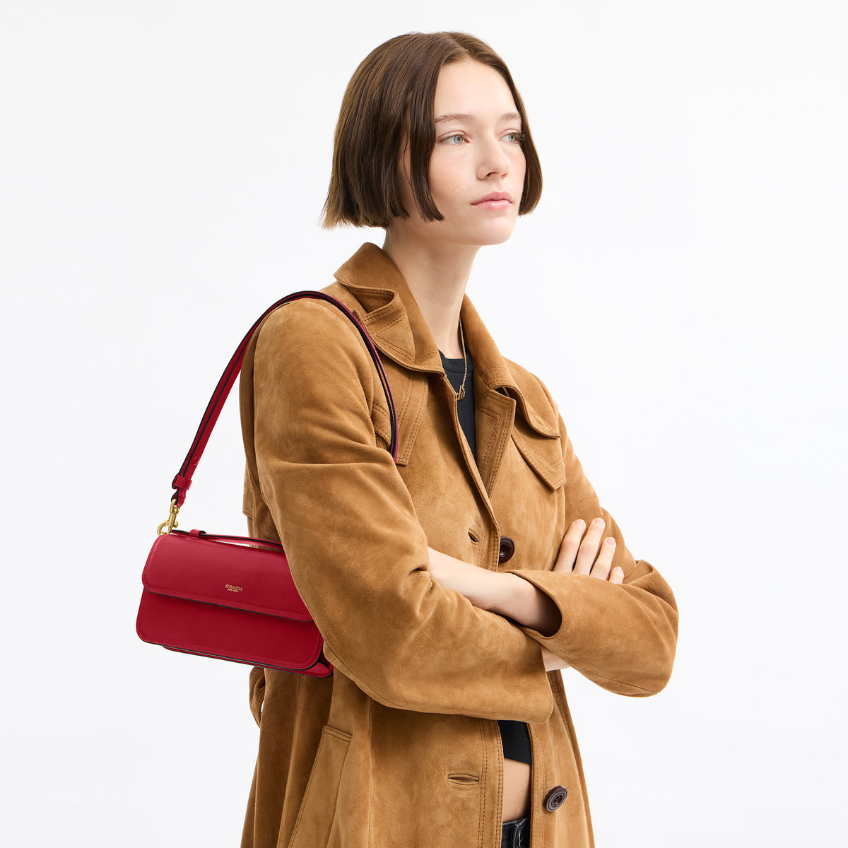 Coach | Cartera cruzada Elora con asa superior