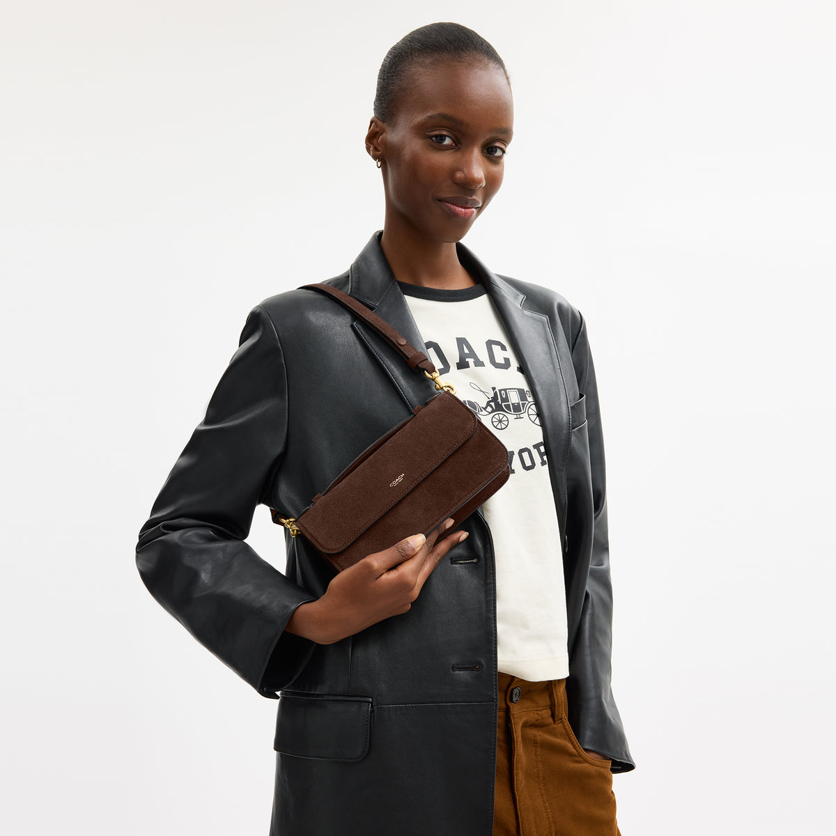 Coach |  Bolso bandolera Elora con asa superior