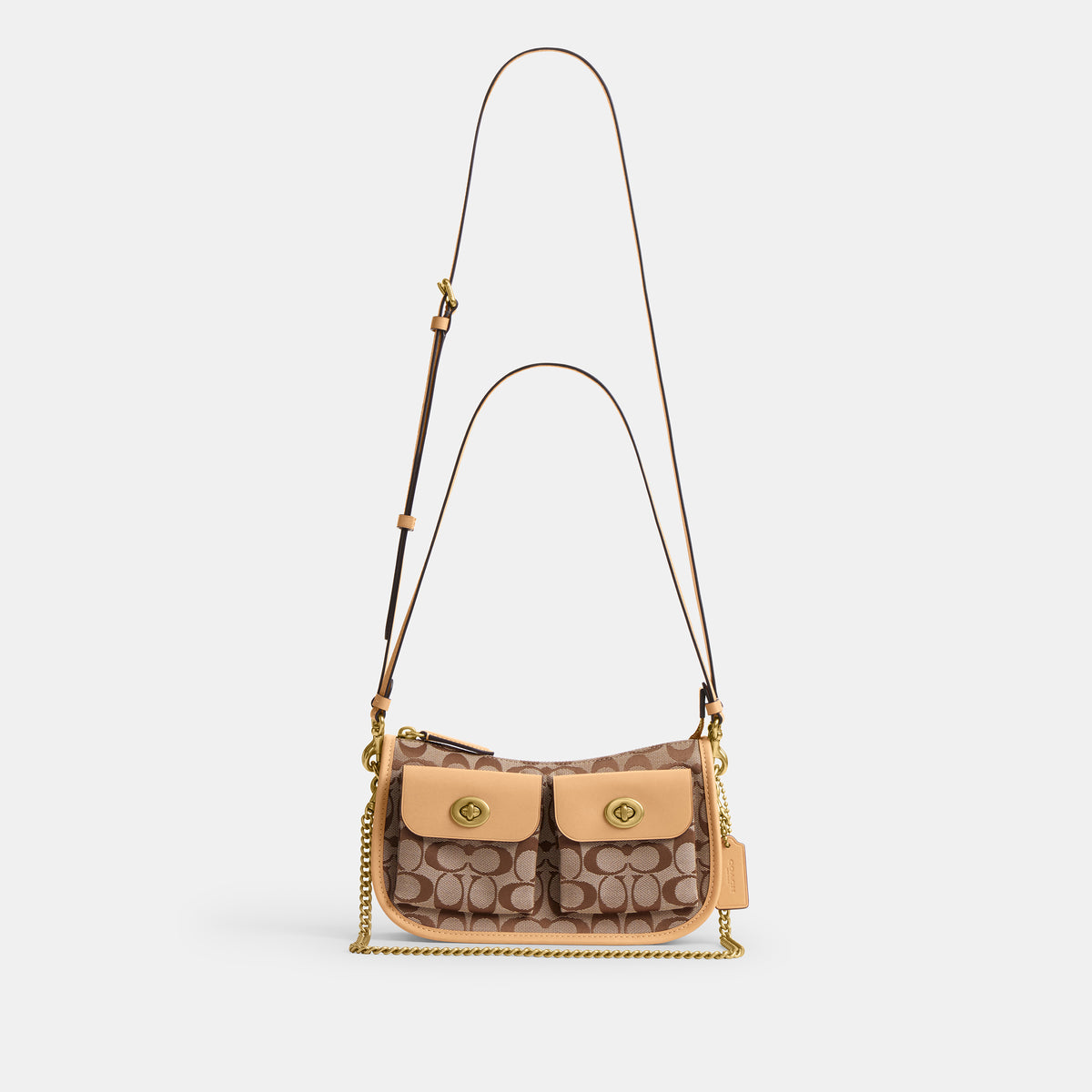 Coach |  Bolso Waverly con doble cierre giratorio en jacquard exclusivo.