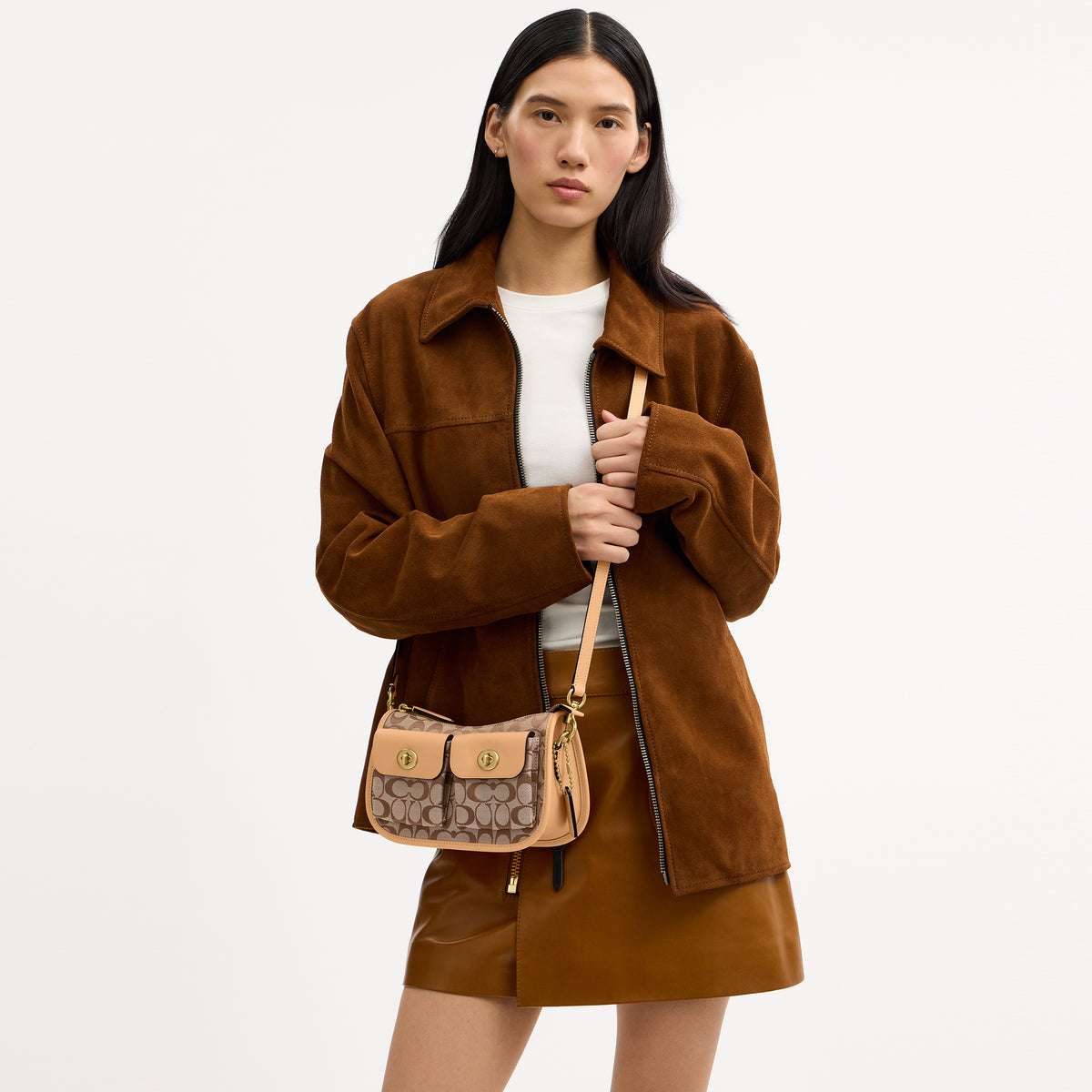 Coach |  Bolso Waverly con doble cierre giratorio en jacquard exclusivo.