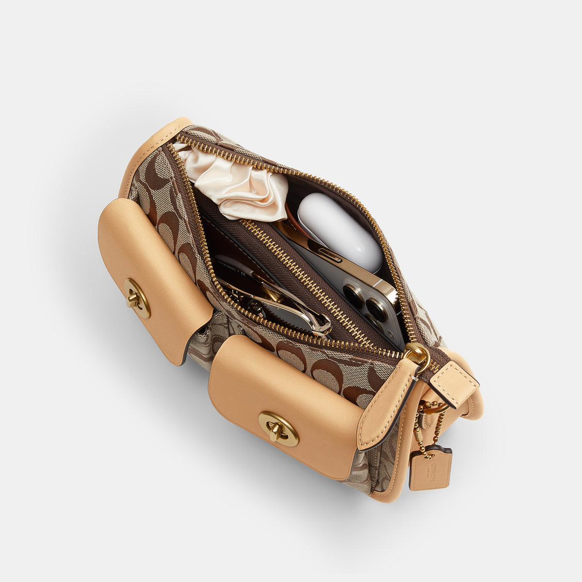 Coach |  Bolso Waverly con doble cierre giratorio en jacquard exclusivo.
