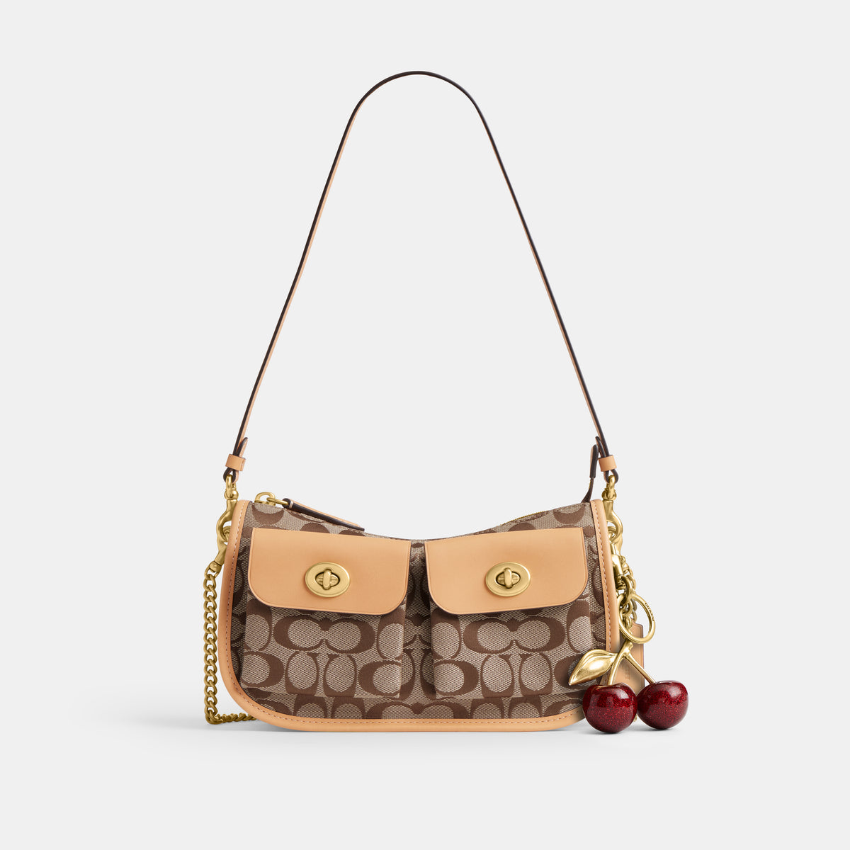 Coach |  Bolso Waverly con doble cierre giratorio en jacquard exclusivo.