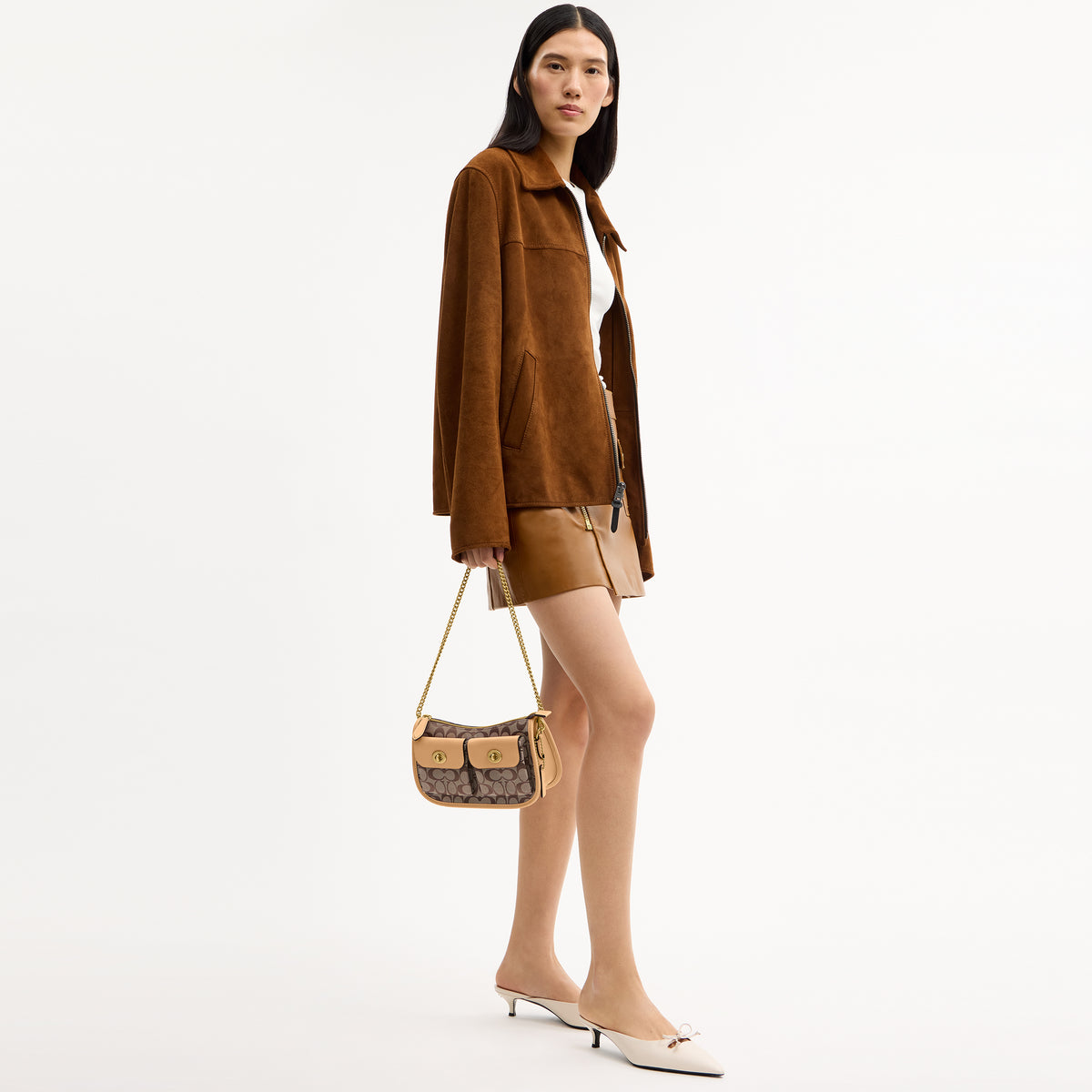 Coach |  Bolso Waverly con doble cierre giratorio en jacquard exclusivo.