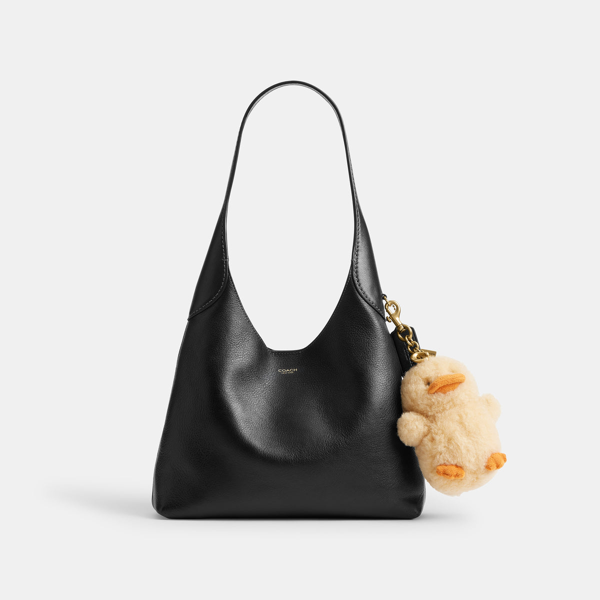Coach  |  Llavero con forma de patito en piel de oveja.