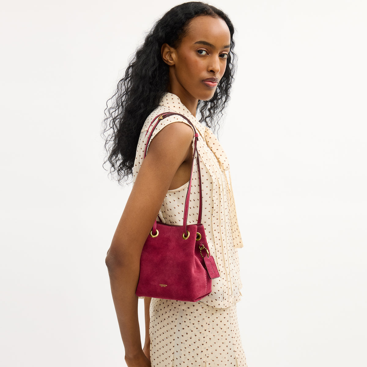 Coach  |  Bolsa con cordón jade