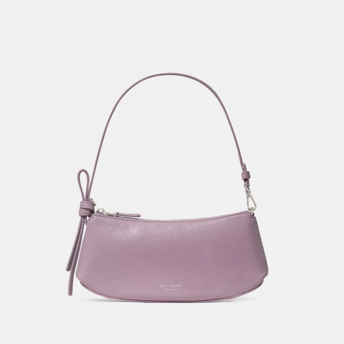 Bolso mini Loop cuero brillante violeta con diseño suave y correa anudada de Kate Spade.