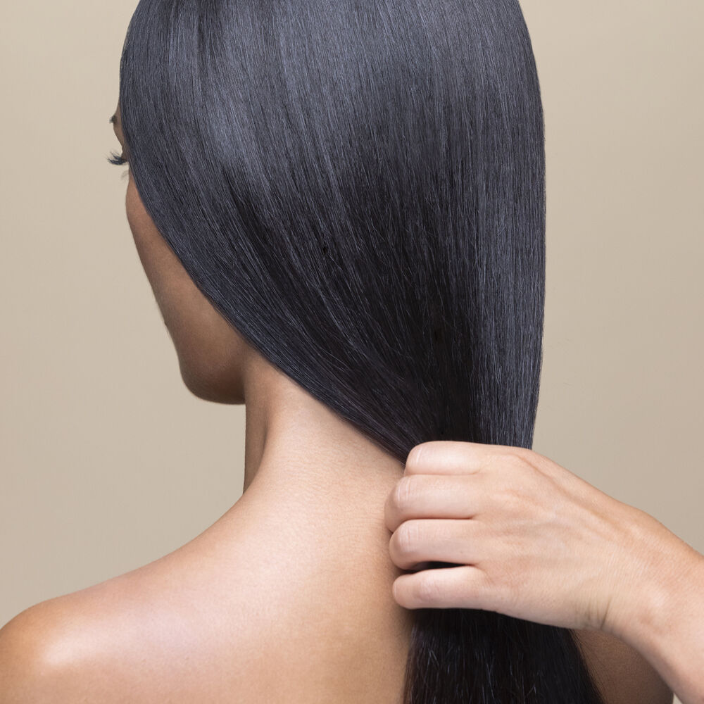 Sisley Paris Hair Rituel Revitalizing Straightening Shampoo with Moringa oil